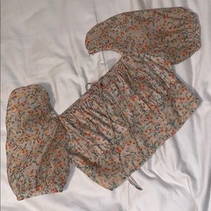 Puffy green floral crop blouse from Dolls Kill